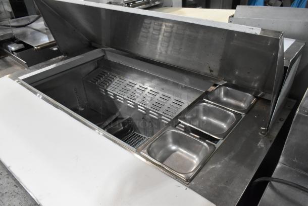 2016 Continental SW48-18M stainless steel sandwich prep table, Mega Top, 115V, 1 phase, clean and in good condition.