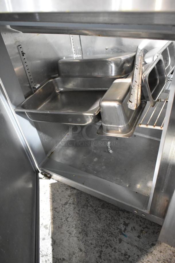 2016 Continental SW48-18M stainless steel prep table interior view with trays, commercial kitchen equipment, 115 volts, good condition.