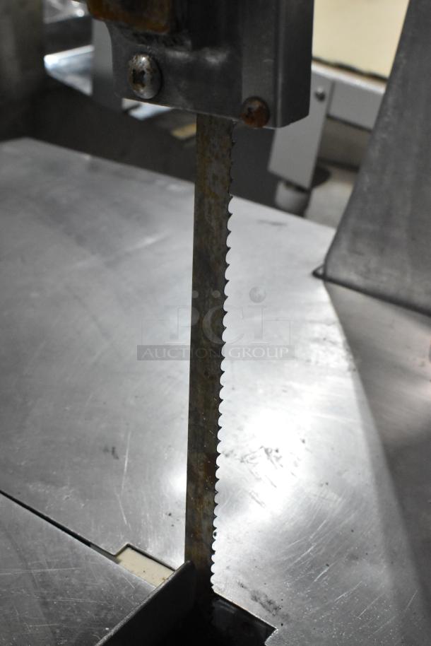 Butcher Boy B12-F commercial meat saw, metal floor style, 115V, 1 phase, showing blade and table surface, used condition.