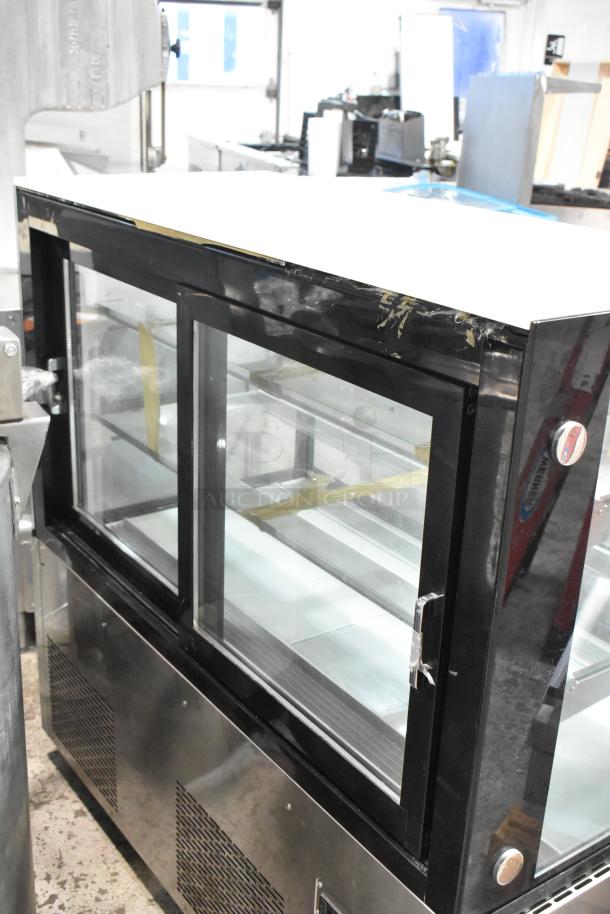Marchia MB48 stainless steel deli display case on commercial casters, sliding glass doors, 115V, 1-phase, excellent condition.