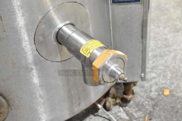 Groen AH/1E 80-gallon stainless steel steam kettle, propane powered, showing spout with caution label. Used condition.