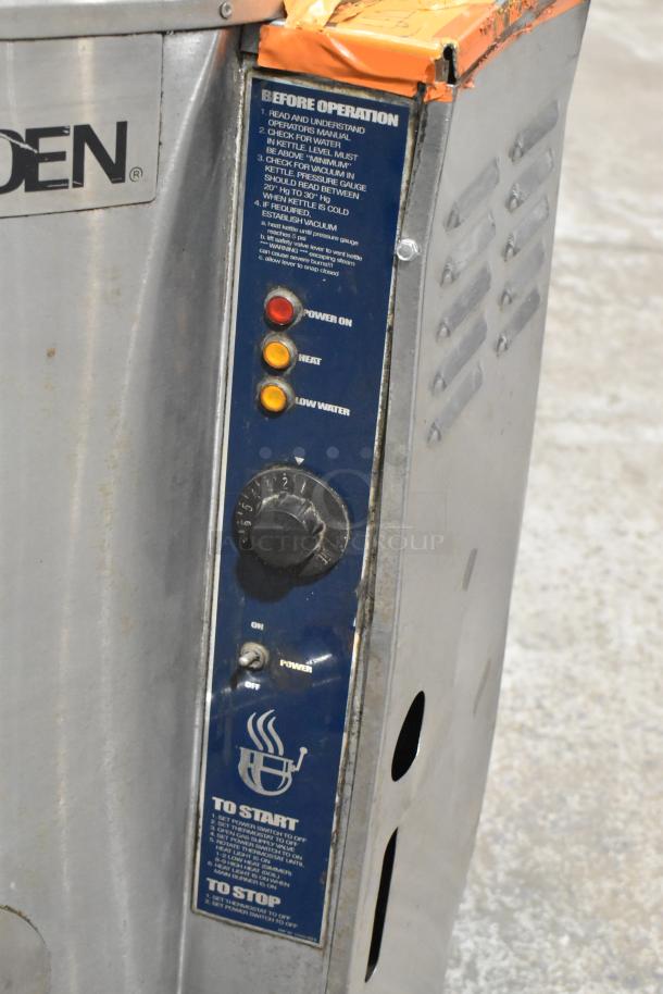 Groen AH/1E 80-gallon steam kettle, stainless steel, propane-powered. Features operation controls and indicator lights.