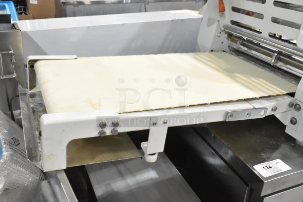 5MCR501 Metal Commercial Countertop Dough Sheeter, 110 Volts, 1 Phase, shown with rolling mechanism and conveyor belt.