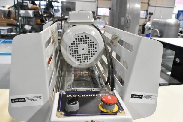 5MCR501 metal countertop dough sheeter in used condition, 110 volts, 1 phase. Features control panel and safety warnings visible.