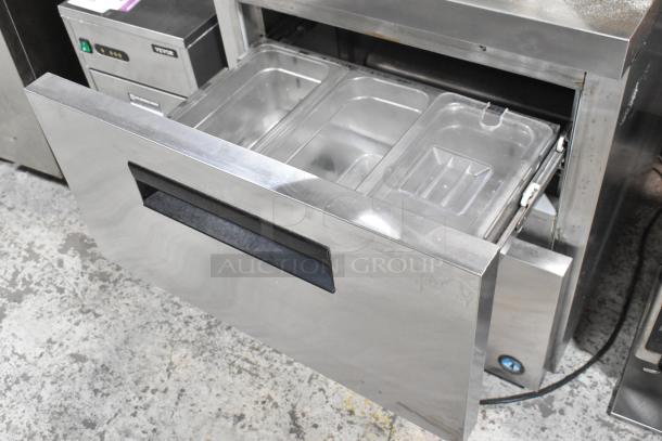 Hoshizaki CRMR27-D stainless steel 2 drawer undercounter cooler, 115 volts, shown open with pans inside; commercial-grade condition.