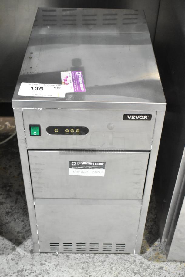 Vevor SZB-20 Commercial Flake Ice Maker, stainless steel, 110V, 1 phase. Green power switch, condition good, auction label marked "135."
