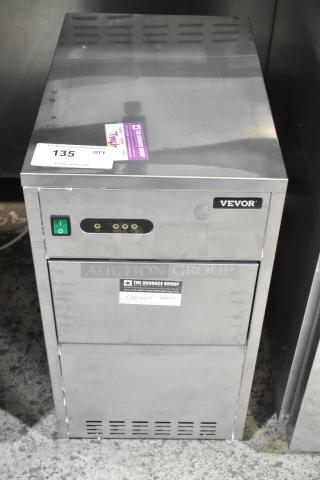 Vevor SZB-20 Commercial Flake Ice Maker, stainless steel, 110V, 1 phase. Green power switch, condition good, auction label marked "135."