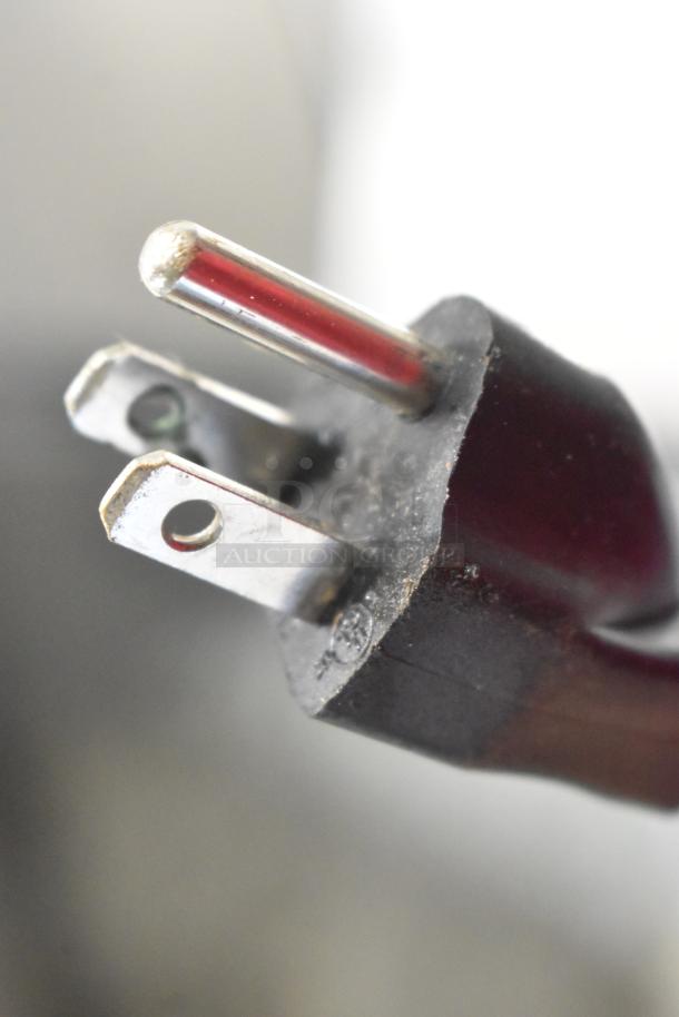 Close-up of a power plug for the Vevor SZB-20 Flake Ice Maker. Standard 110V, 1 Phase, suitable for commercial use.