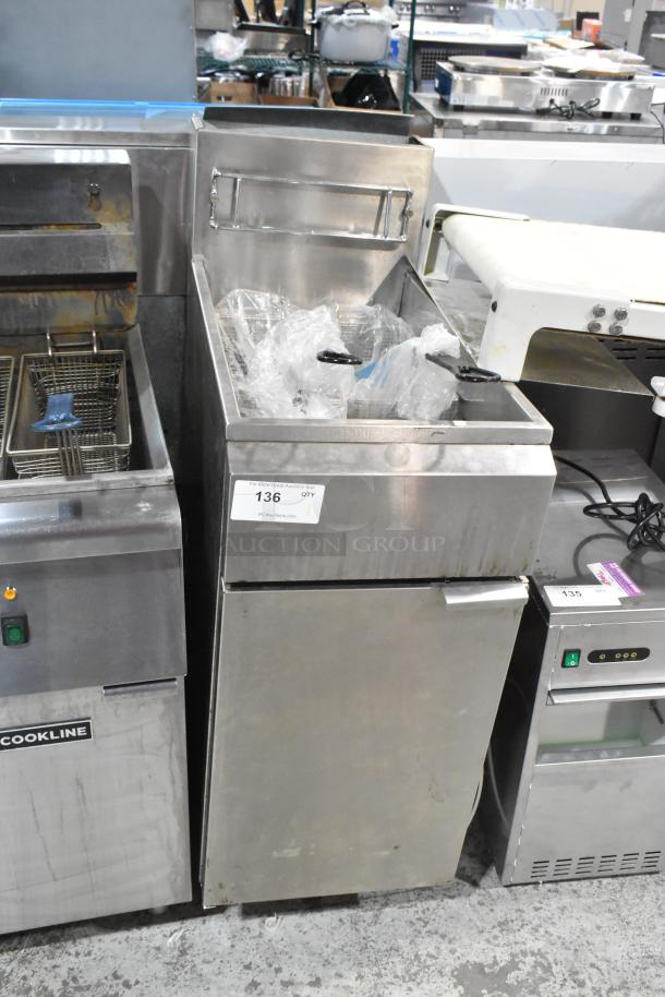 Stainless steel KUT50FRN50SNG commercial deep fat fryer with 2 metal fry baskets, natural gas powered, floor style.