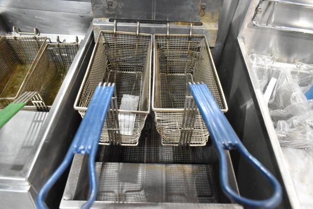 2023 Cookline CF-40D stainless steel electric fryer with two metal fry baskets. 208V, 3 Phase, commercial use.