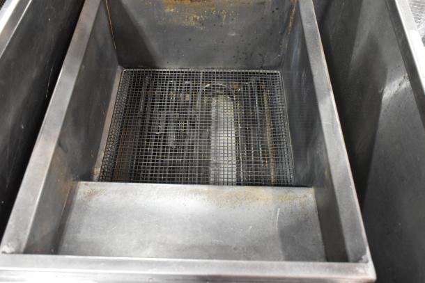 2023 Cookline CF-40D stainless steel commercial deep fat fryer, interior view, includes 2 metal fry baskets, 208V, 3-phase.