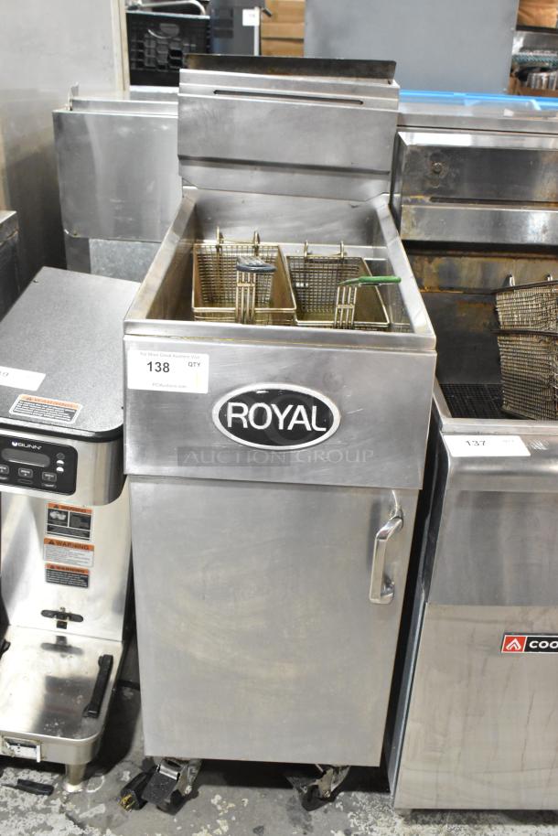 Royal stainless steel commercial deep fat fryer with two metal fry baskets and commercial casters. Model in good condition.