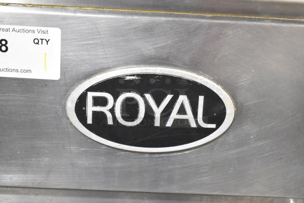 Royal stainless steel commercial deep fat fryer with brand logo. Includes two metal fry baskets and commercial casters.