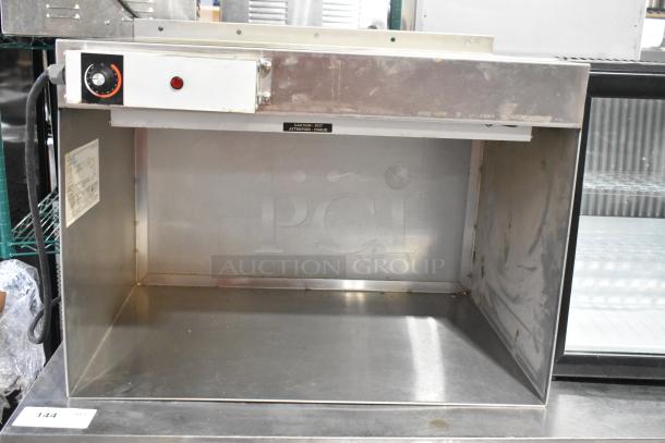 Hatco GRAH-24D metal commercial food warmer, 120 volts, 1 phase. Visible temperature control and caution label.