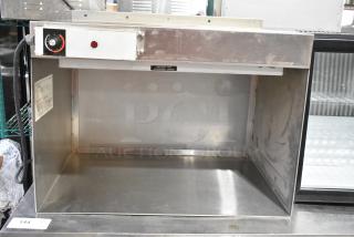 Hatco GRAH-24D metal commercial food warmer, 120 volts, 1 phase. Visible temperature control and caution label.