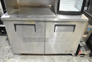 True TUC-48 stainless steel 2-door undercounter cooler on casters, 115V, 1 phase, with visible use marks.