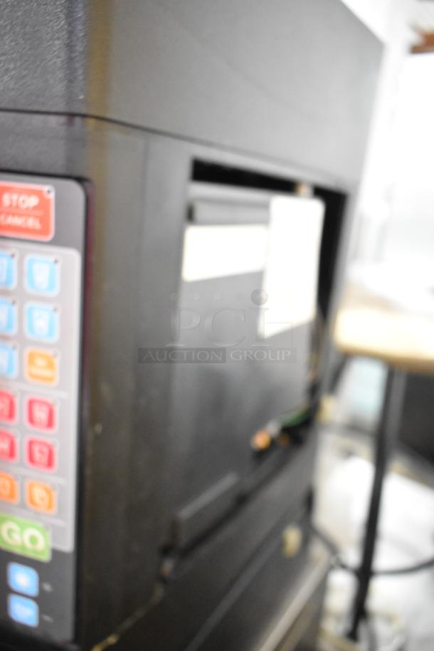 Taylor X83684-12 stainless steel commercial drink blender, 115V, 1 phase, visible control panel with buttons.