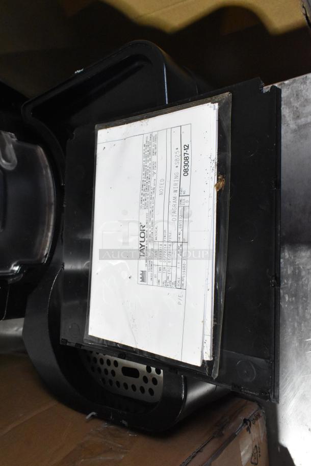 Taylor X83684-12 stainless steel commercial drink blender with visible label, 115 volts, 1 phase, excellent condition.