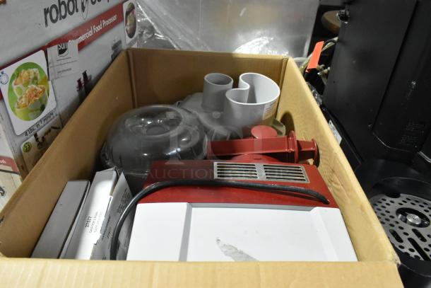 Robot Coupe R2N food processor with bowl, lid, continuous feed head, grater and slicer blades, in original box, 120V.