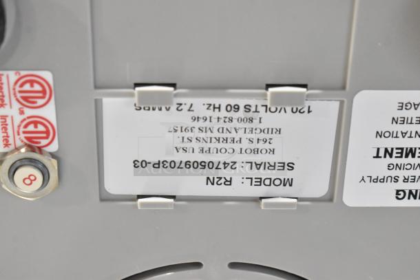 Robot Coupe R2N food processor label showing model and serial number, indicating 120 volts, 1 phase power.
