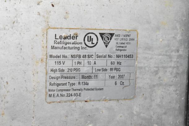 Leader NSFB 48 S/C stainless steel commercial two-door undercounter cooler with casters. Tag shows 115V, 1 phase, model info.