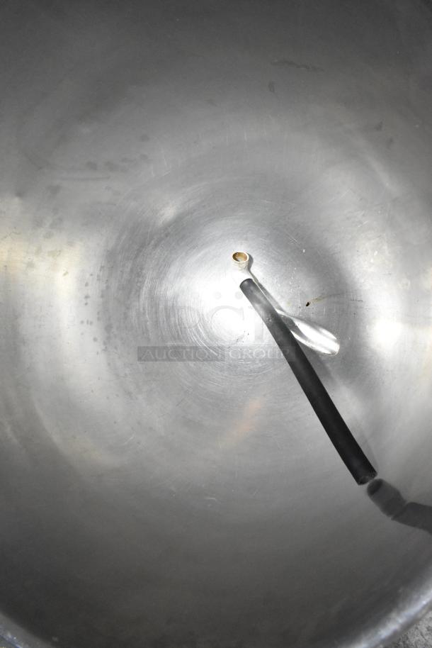 Cleveland stainless steel commercial tilting kettle interior, shows smooth surface, stainless steel construction.