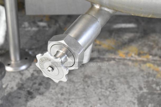 Cleveland stainless steel tilting kettle valve, featuring a handwheel marked "Cleveland," shows excellent condition.