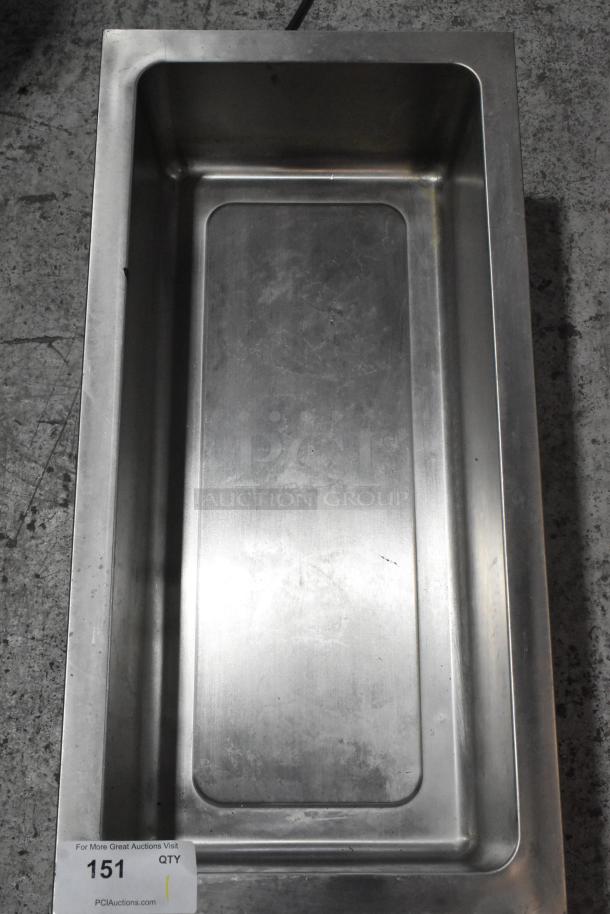 Winco FW-L600 stainless steel commercial countertop food warmer, 120V, 1 phase. Minor surface wear visible. Auction tag "151."