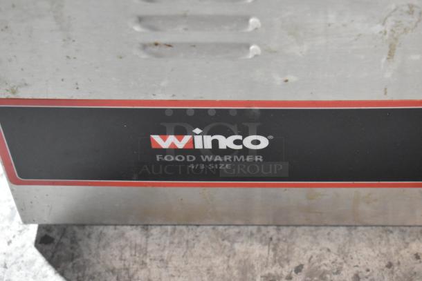 Winco FW-L600 stainless steel food warmer, 4/3 size label, commercial countertop model, 120V, 1 phase, used condition.