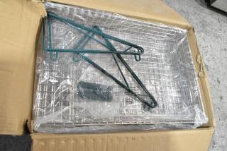 Box containing chrome finish wire baskets, new but labeled with scratch and dent condition. Includes mounting brackets.
