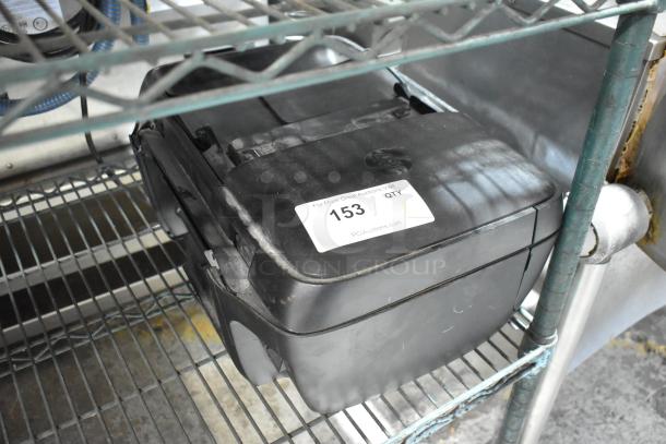 HP OfficeJet 3830 multifunction device on shelf, featuring scanning, copying, printing, and fax capabilities. Auction tag indicates lot 153.