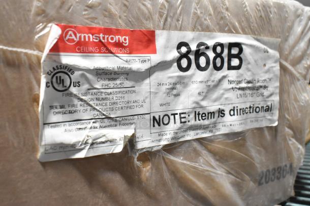 Box of 12 Armstrong 868B Nonperf Ceiling Tiles, 24x24 in, white, new, fire-resistant, UL classified, directional use.