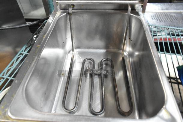 Stainless steel countertop electric deep fat fryer, 115 volts, 1 phase, clean interior, visible heating element, good condition.