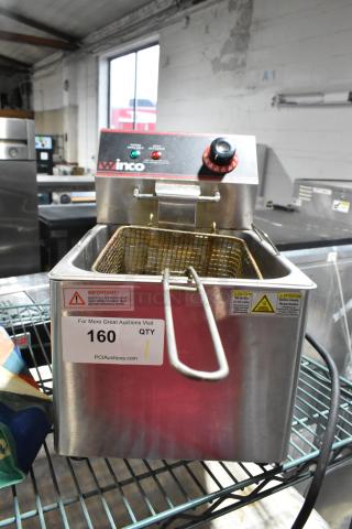 Winco Stainless Steel Electric Deep Fat Fryer with metal basket, 115V, 1 phase, featuring temperature control and operational labels.