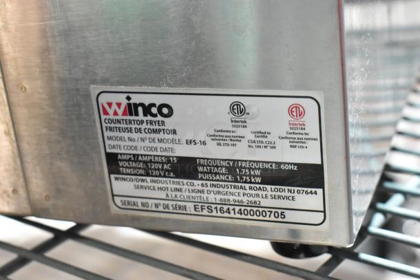 Winco stainless steel countertop electric deep fat fryer, model EFS-16, with metal fry basket. Voltage: 120V, 1.75kW.