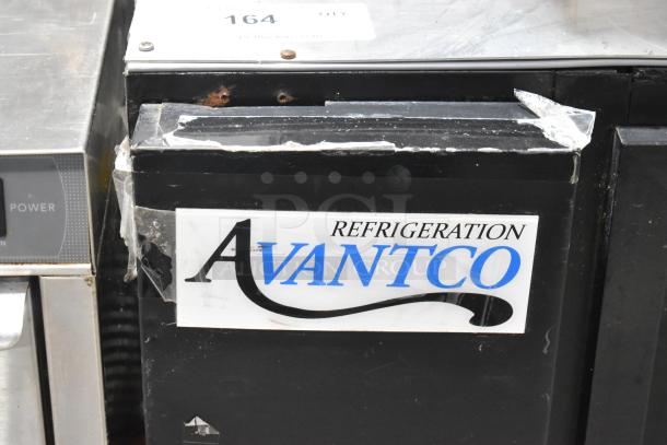 Avantco 178UBB48SHC commercial 2-door undercounter cooler, visible wear and scratches, label with brand name, 115 volts.