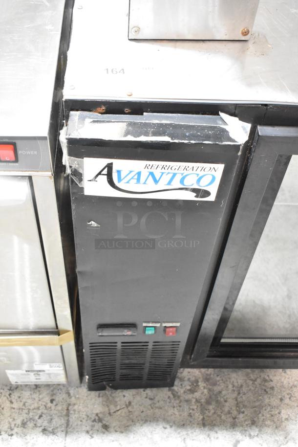 Avantco 178UBB48SHC metal commercial 2-door undercounter cooler. Features visible wear. 115 volts, 1 phase. Logo on front.