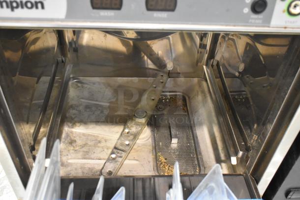 2016 Champion UH130B undercounter dishwasher, stainless steel, commercial-grade, visible interior condition, 120-208/230V, 1 Phase.