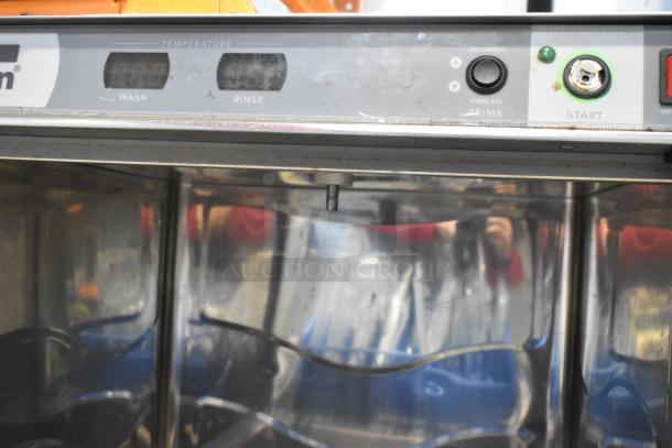 2016 Champion UH130B stainless steel undercounter dishwasher, control panel with wash/rinse settings, good condition.