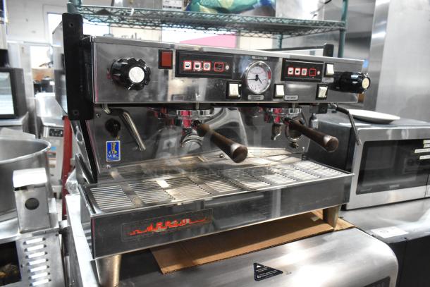 La Marzocco Linea stainless steel 2-group espresso machine with portafilters, steam wands, and control panel.