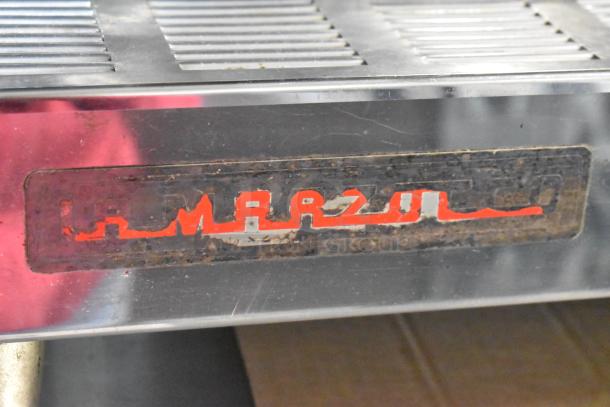 La Marzocco Linea 2 Group Espresso Machine, stainless steel, visible wear, includes 2 portafilters, 2 steam wands.