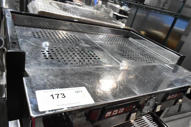 La Marzocco Linea 2-group commercial espresso machine with stainless steel body, 2 portafilters, 2 steam wands, visible minor surface wear.