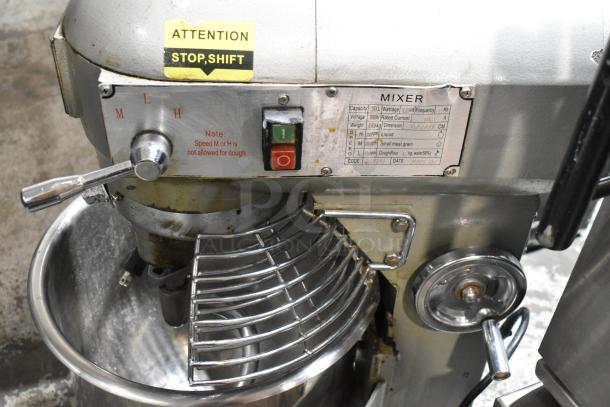 2019 metal commercial 30L planetary dough mixer with mixing bowl and guard. Features: 110 volts, 1 phase, M/H speed caution.