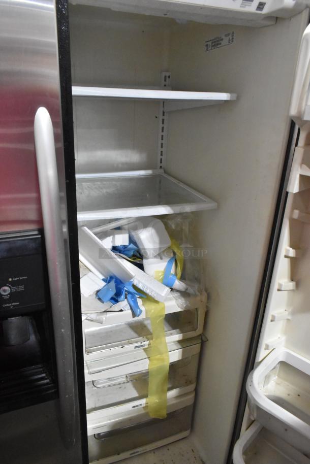 KitchenAid KSRP22FSSS01 stainless steel reach-in cooler with freezer. Features include multiple shelves and freezer drawers.