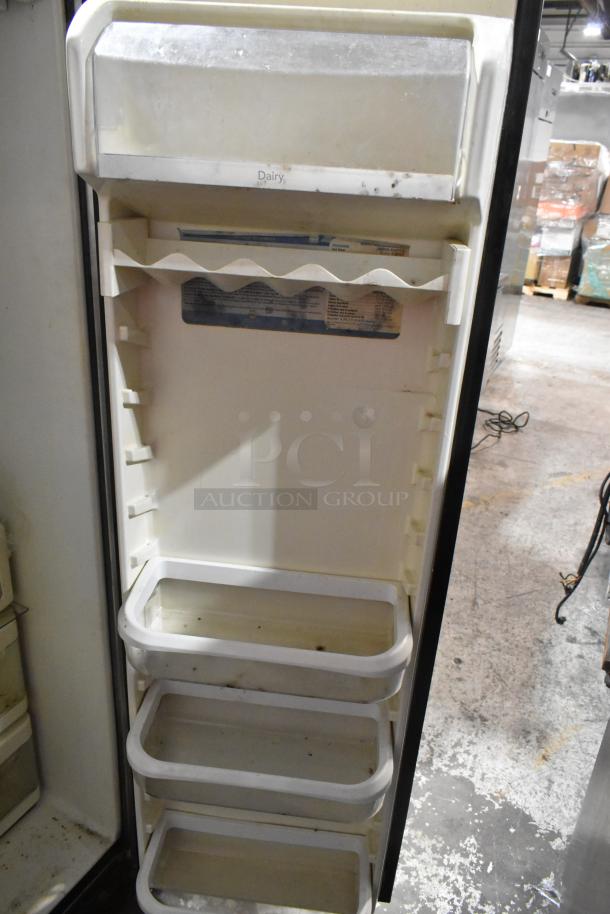 KitchenAid KSRP22FSSS01 stainless steel cooler with freezer, 115V, 1 phase. Visible interior shelves, some wear.