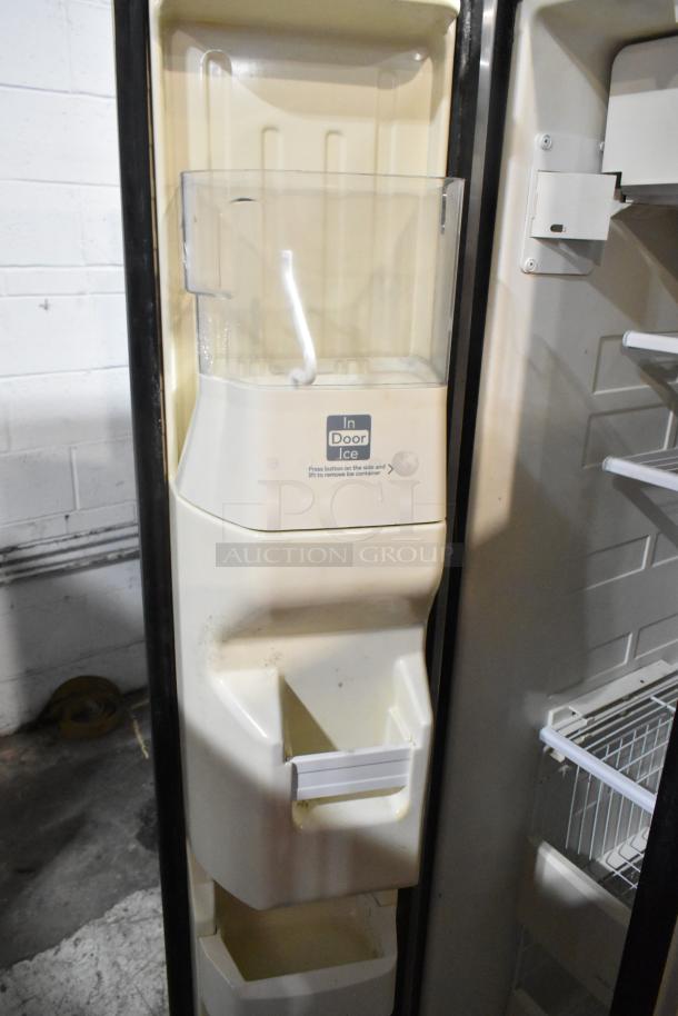 KitchenAid KSRP22FSSS01 stainless steel cooler and freezer with in-door ice maker; 115V, 1 Phase. Signs of use visible.