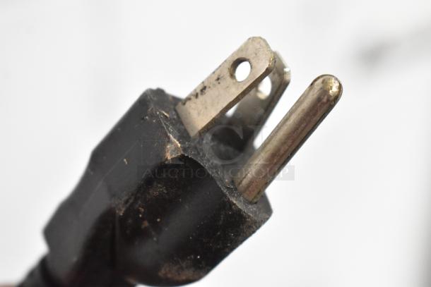 Mahlkonig Peak grinder power plug, 120 volts, 1 phase; visible wear, suitable for commercial espresso bean grinding.