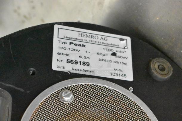 Mahlkonig Peak espresso grinder base, metal, no hopper, 120V, 1 phase. Label shows model Peak, serial 569189, made in Germany.