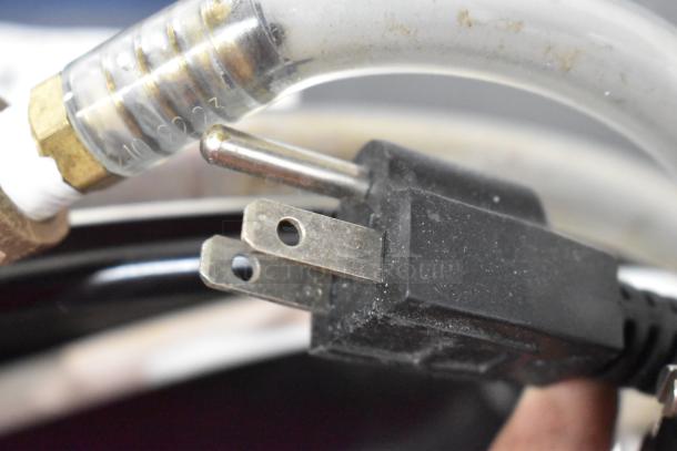 Close-up of a power plug and tubing from the Brood V2PX Nitro Cold Brew Tap Dispenser. 220 volts, 1 phase.