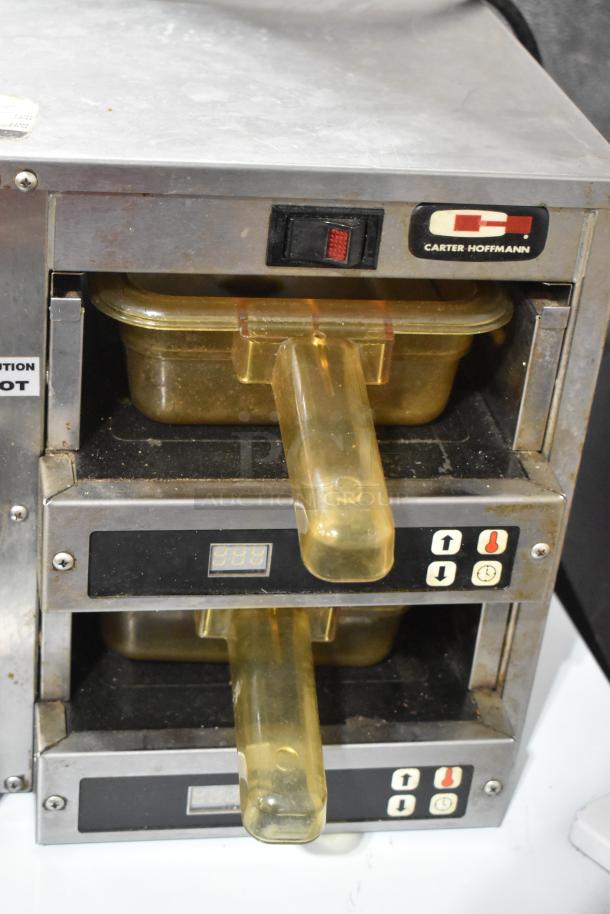 Carter Hoffmann MC2W2S stainless steel countertop heated merchandiser, dual shelves, digital controls, used condition.